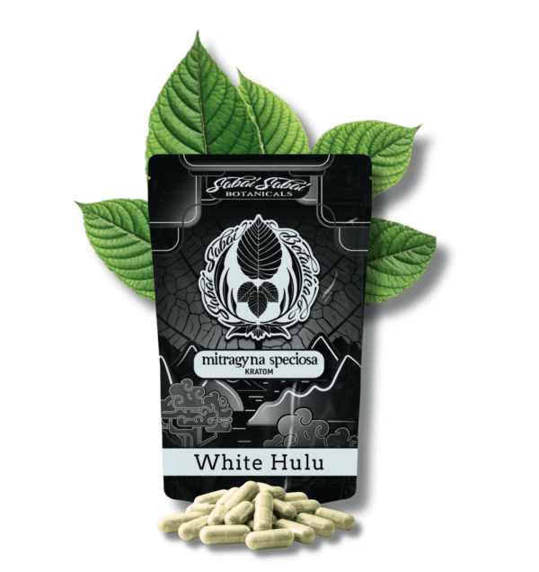 A black bag of white Hulu kratom in front of leaves